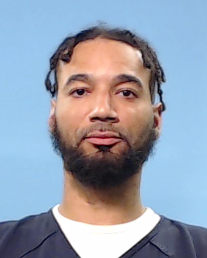 Jones, Dominic Voloiz booking photo