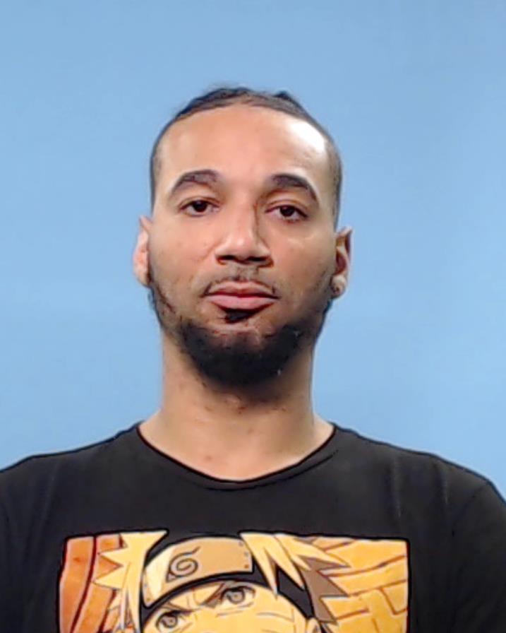 Jones, Dominic Voloiz booking photo