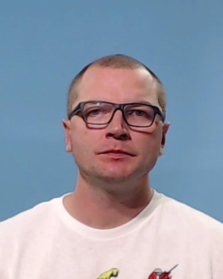 Mendek, Michael Nelson booking photo