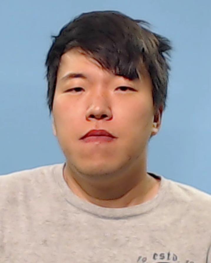 Kim, Eric booking photo