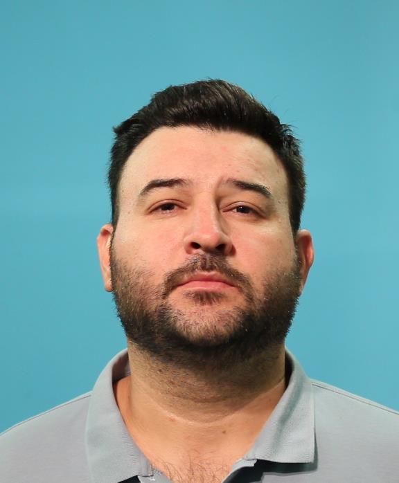 Vela, Santos, Jr. booking photo