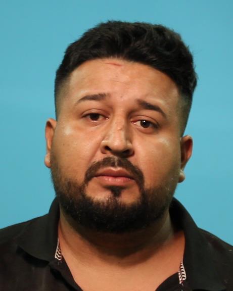 Benitez, Dominguez booking photo