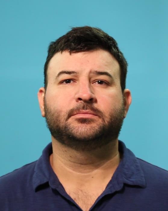 Vela, Santos, Jr. booking photo