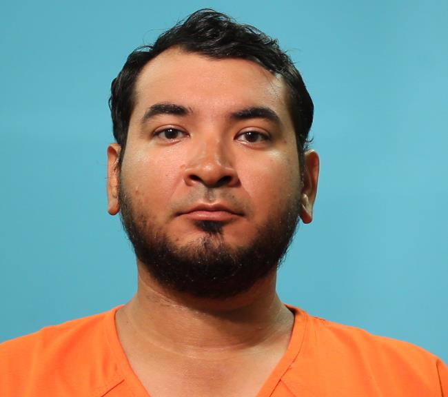 Alanis, Miguel booking photo