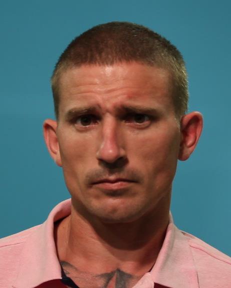 Warn, Ryan Tracy booking photo