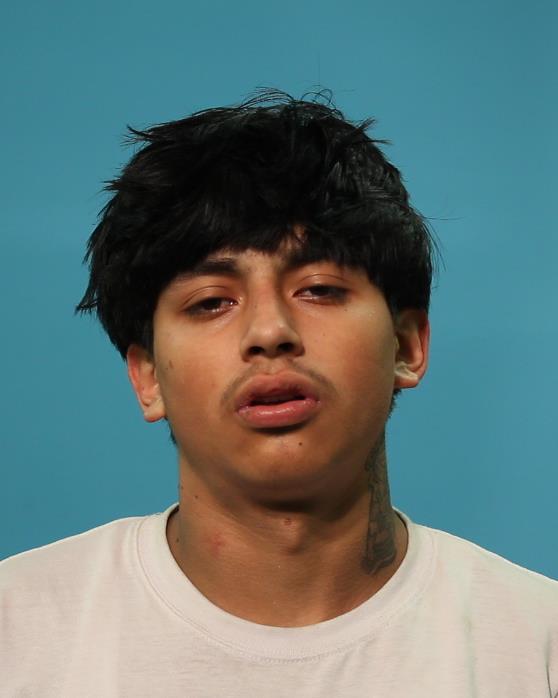 Sevilla, Isac booking photo