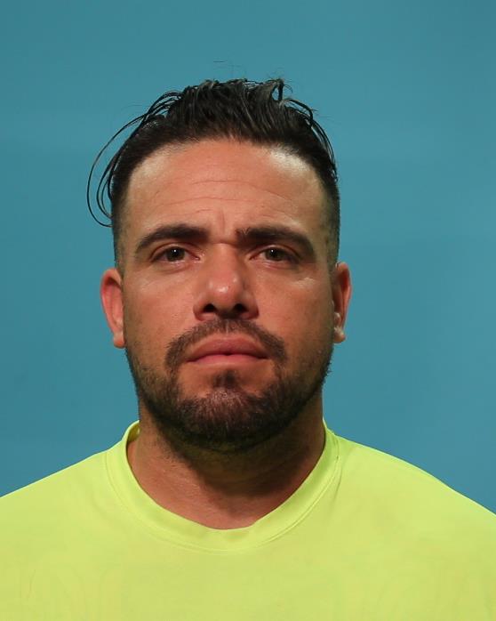 De La Cruz, William Santos booking photo