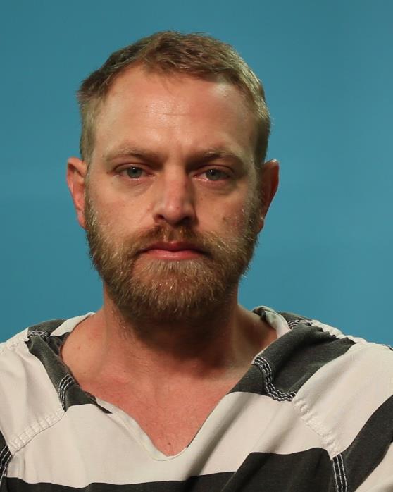 Wilson, Chaz Brennan booking photo