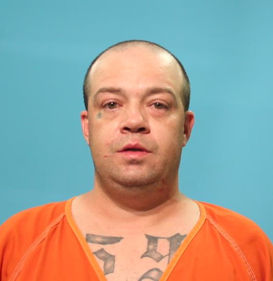 Neighbours, Carroll Wayne booking photo