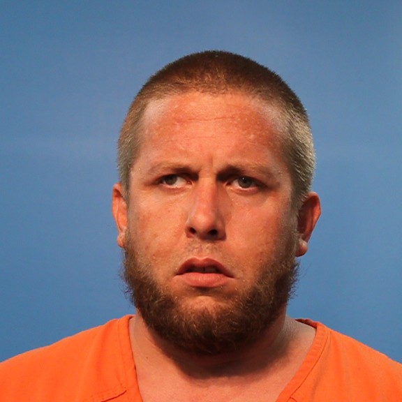 Mangum, Justin Ellis booking photo
