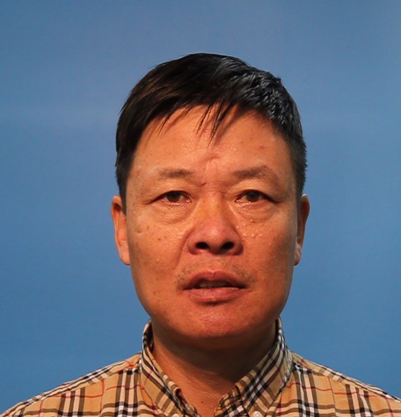 He, Zheping booking photo