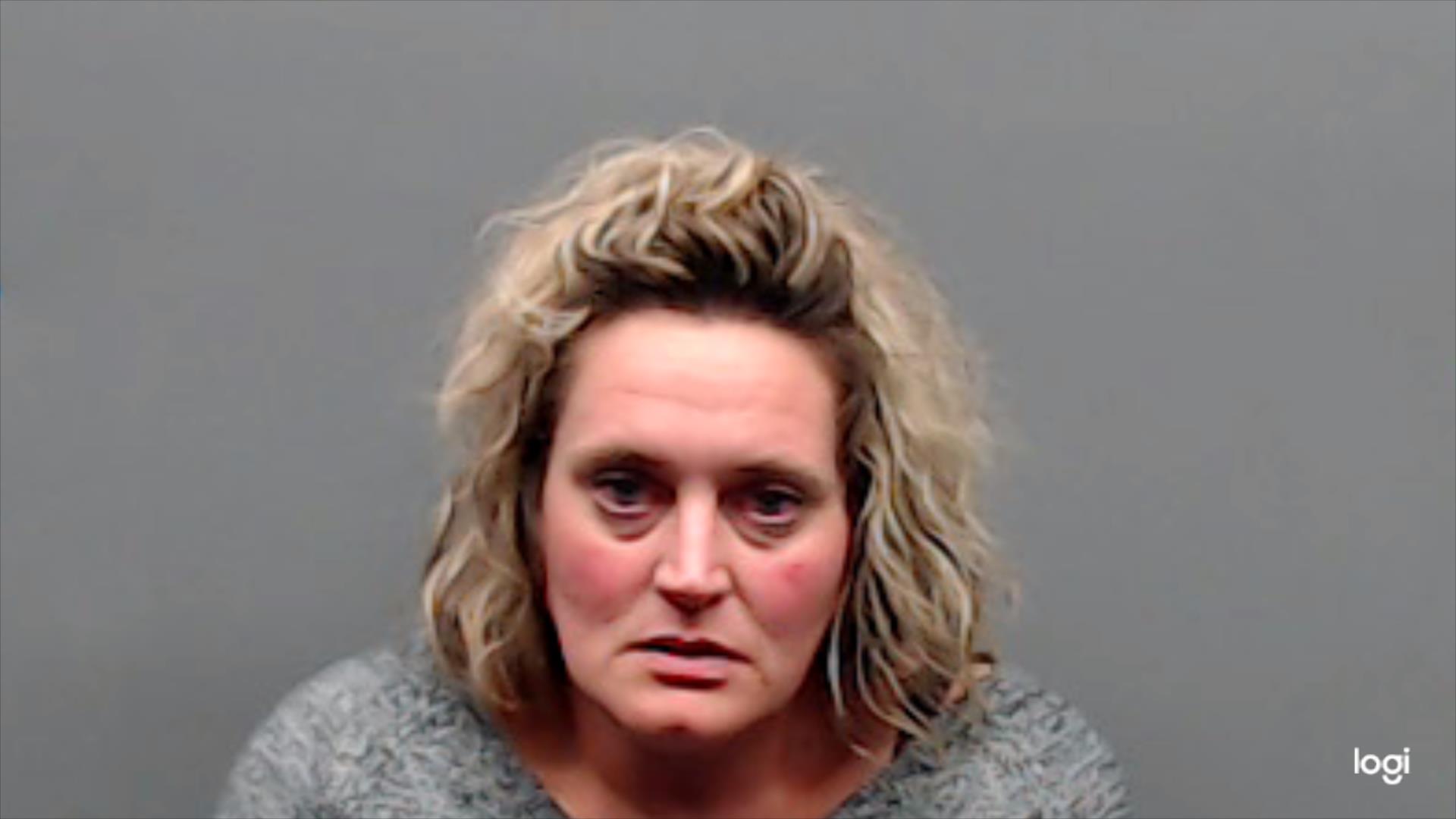 Cook, Miranda booking photo