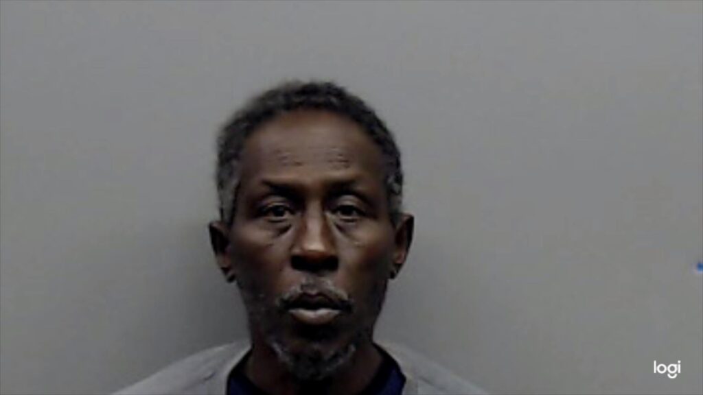 COX, YUL booking photo