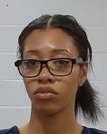 REID, DEJA booking photo