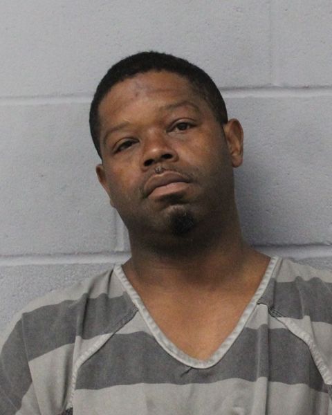 JOHN MILLER arrested by APD