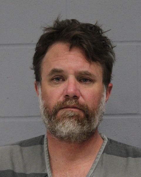 NATHAN CLAWSON arrested by APD