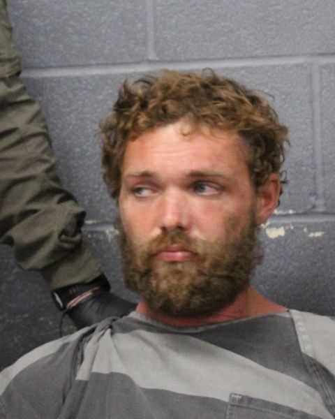 JOHN MARTIN arrested by APD