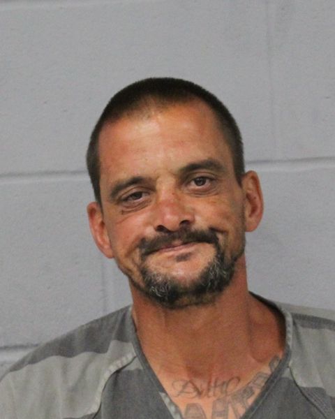 SHANE URICH arrested by APD